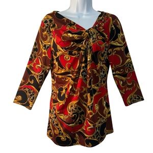 CARMEN asymmetrical twist neck 3/4 sleeves LG top red gold black scrolling NWOT